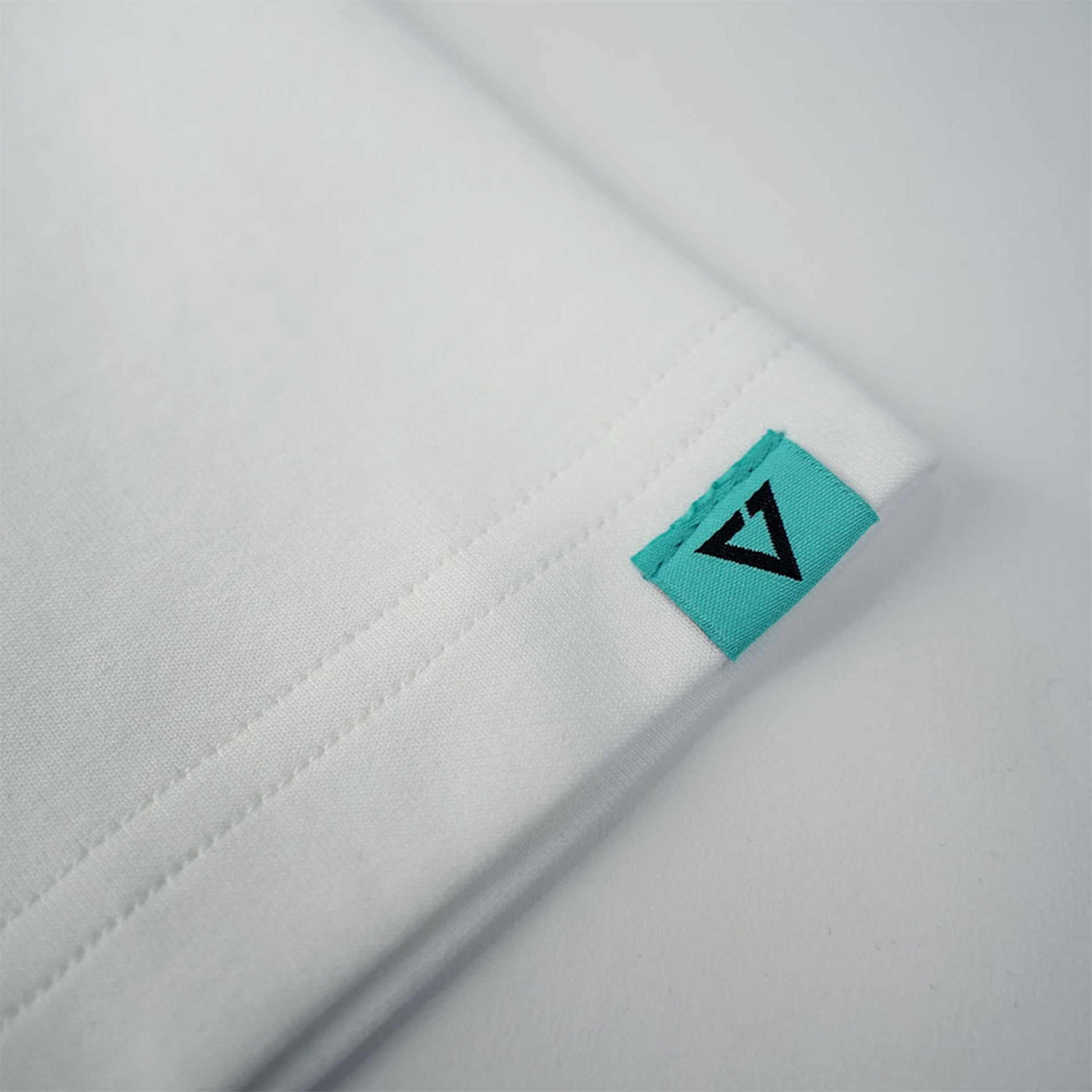 EGLAF | Basic 26 Triangle Logo Tee White - SWAGANZ
