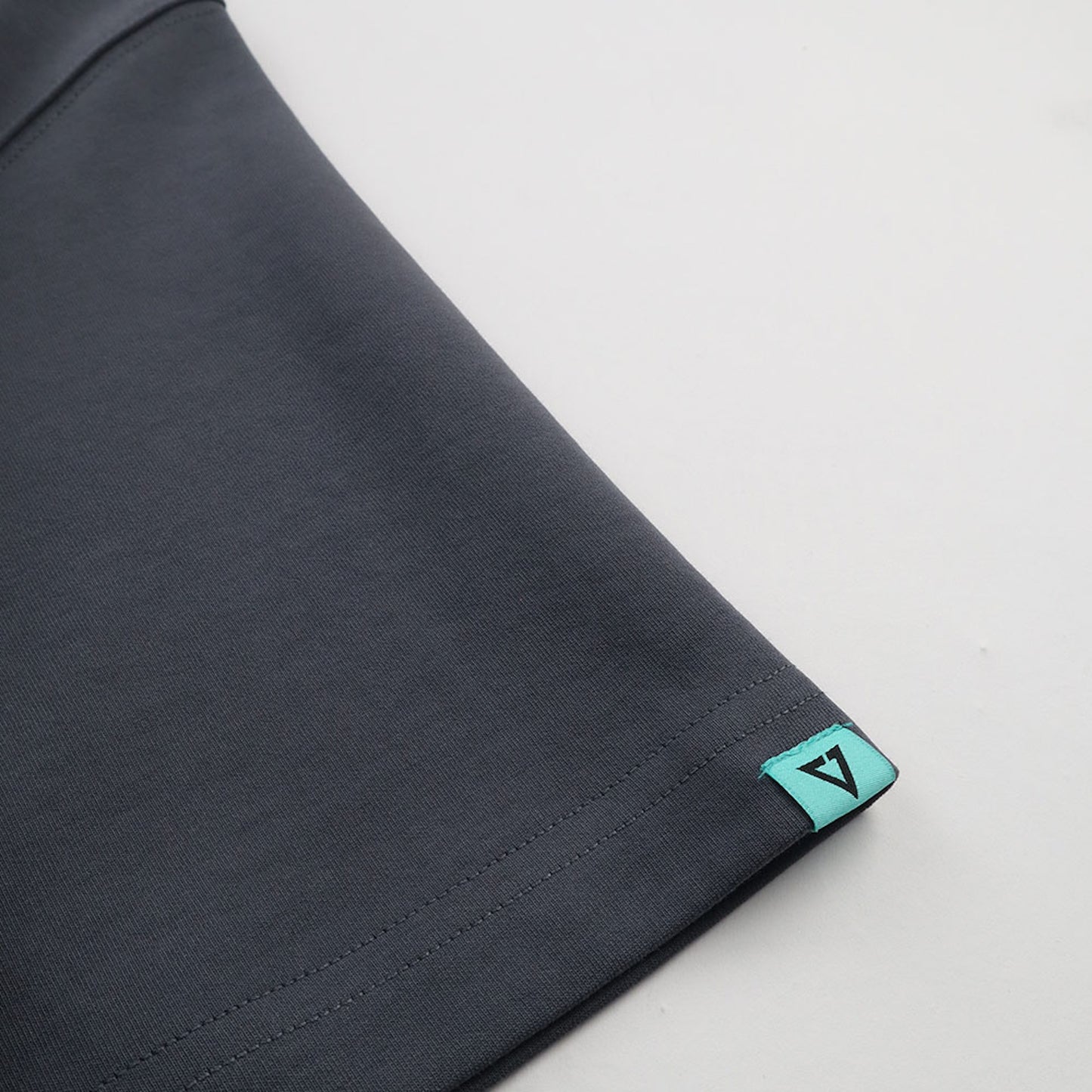 EGLAF | Sculpta Triangle Emblem Tee Dark Grey