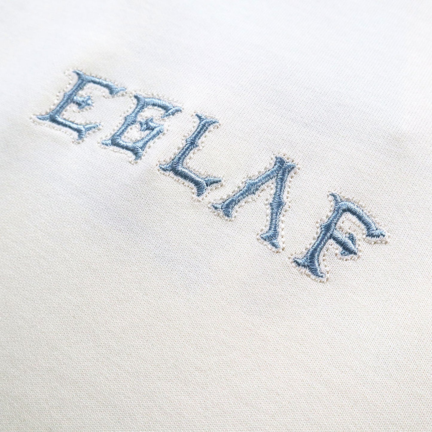 EGLAF | Sculpta Triangle Emblem Tee Cream White