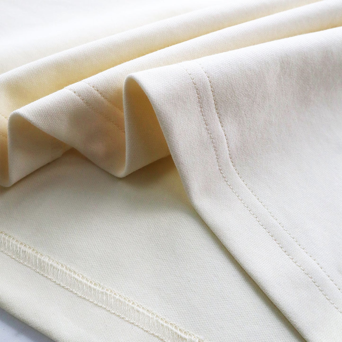 EGLAF | Sculpta Triangle Emblem Tee Cream White