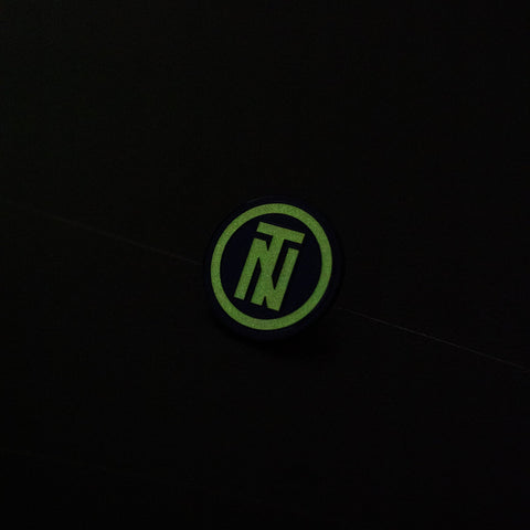 TNTCO Round Logo Pin (Glow In The Dark)