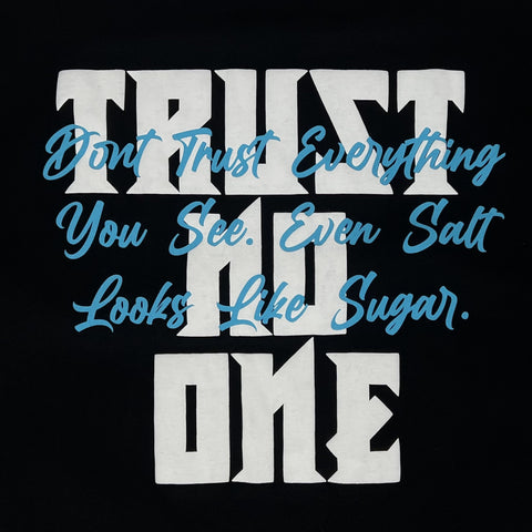 TRUST NO ONE | Slogan Puff Tee Black